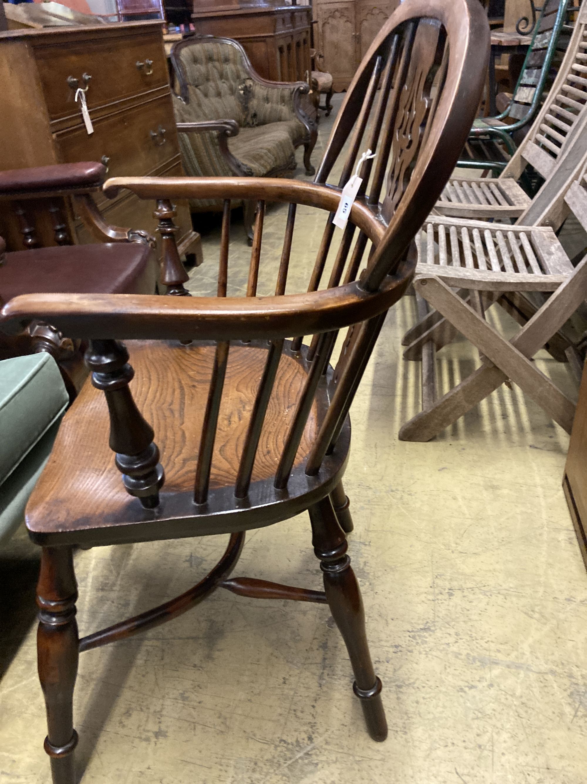 A 19th century yew and elm Windsor elbow chair, width 53cm, depth 40cm, height 94cm